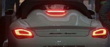 Rear of a car with lit third brake light